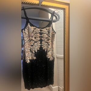 VINTAGE Elegant Black and Gold Embellished MINI Dress by ALYCE DESIGNS